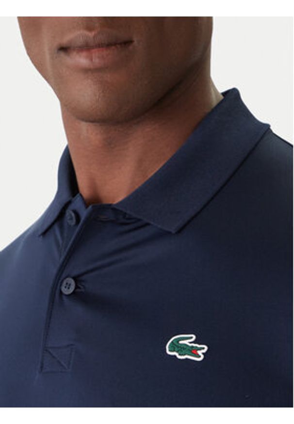 Lacoste Polo DH2615 Granatowy Regular Fit. Typ kołnierza: polo. Kolor: niebieski. Materiał: syntetyk