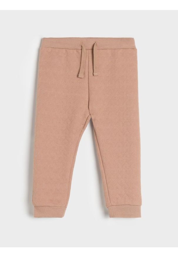 Sinsay - Spodnie - brązowy. Kolor: brązowy. Materiał: materiał. Długość: długie. Wzór: nadruk