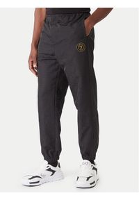 EA7 Emporio Armani Spodnie dresowe 7M000264 AF13722 UC001 Czarny Modern Fit. Kolor: czarny. Materiał: syntetyk