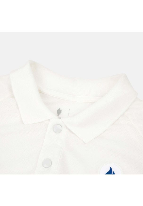 Polo Le Coq Sportif Efro 24 N° 2. Typ kołnierza: polo. Kolor: biały. Materiał: tkanina, poliester. Wzór: haft, aplikacja