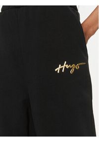 Hugo Spodnie dresowe Nasuede_2 50508560 Czarny Relaxed Fit. Kolor: czarny. Materiał: dresówka, bawełna