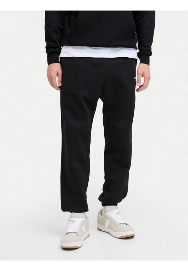 Jack & Jones - Jack&Jones Spodnie dresowe Kane Soho 12278943 Czarny Regular Fit. Kolor: czarny. Materiał: bawełna