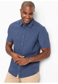 bonprix - Koszula z krótkim rękawem z przewiewnej mieszanki lnu. Kolor: niebieski. Materiał: len. Długość rękawa: krótki rękaw. Długość: krótkie. Sezon: lato #1