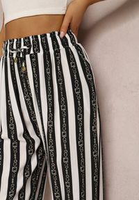 Renee - Czarne Spodnie Kassene. Kolor: czarny. Materiał: tkanina, wiskoza. Wzór: nadruk, aplikacja, paski. Styl: wakacyjny #2