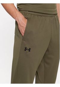 Under Armour Spodnie dresowe Ua Armour Fleece Joggers 1373362 Khaki Loose Fit. Kolor: brązowy. Materiał: dresówka, syntetyk