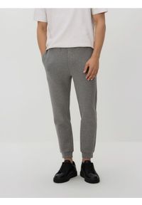 Reserved - Spodnie dresowe slim fit - jasnoszary. Kolor: szary. Materiał: dresówka