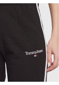 Tommy Jeans Spodnie dresowe DW0DW14993 Czarny Relaxed Fit. Kolor: czarny. Materiał: syntetyk
