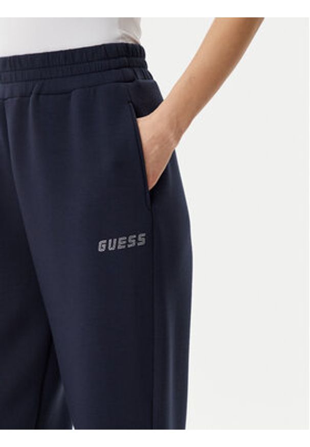 Guess Spodnie dresowe V4BB13 K7UW2 Granatowy Regular Fit. Kolor: niebieski. Materiał: wiskoza