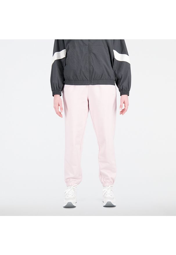 Spodnie damskie New Balance WP31503SOI – różowe. Kolor: różowy. Materiał: bawełna, dresówka, prążkowany