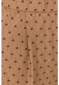 Bruuns Bazaar spodnie damskie kolor beżowy szerokie high waist. Stan: podwyższony. Kolor: beżowy. Materiał: tkanina