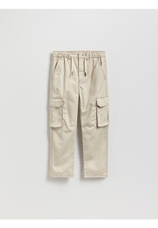 Reserved - Spodnie z kontrastowymi przeszyciami - złamana biel. Materiał: tkanina, bawełna