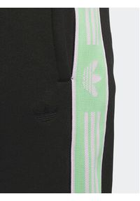 Adidas - adidas Spodnie dresowe Tape HM1530 Czarny Regular Fit. Kolor: czarny. Materiał: bawełna, dresówka #4