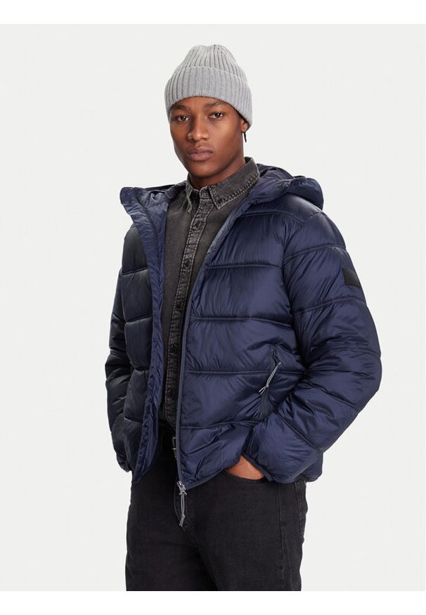 Tommy Jeans Kurtka zimowa DM0DM22044 Granatowy Regular Fit. Kolor: niebieski. Materiał: syntetyk. Sezon: zima