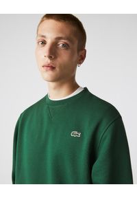 Lacoste - LACOSTE - Zielona bluza z haftowanym logo. Kolor: zielony. Materiał: bawełna. Wzór: haft