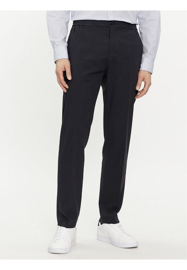 TOMMY HILFIGER - Tommy Hilfiger Chinosy Chelsea MW0MW33933 Granatowy Slim Fit. Kolor: niebieski. Materiał: bawełna