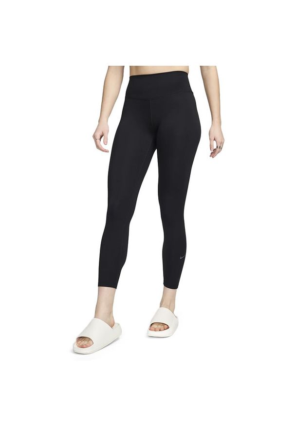 Legginsy Nike One FN3232-010 - czarne. Okazja: na spacer, na co dzień. Kolor: czarny. Materiał: materiał, poliester, elastan. Technologia: Dri-Fit (Nike). Styl: sportowy, casual. Sport: turystyka piesza