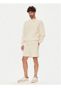 Tommy Jeans Szorty sportowe New Classic Beach DM0DM21781 Beżowy Relaxed Fit. Kolor: beżowy. Materiał: bawełna. Styl: sportowy #5
