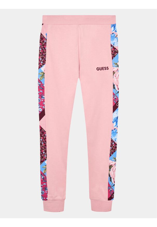 Guess Spodnie dresowe J3BQ18 KAX73 Różowy Regular Fit. Kolor: różowy. Materiał: bawełna