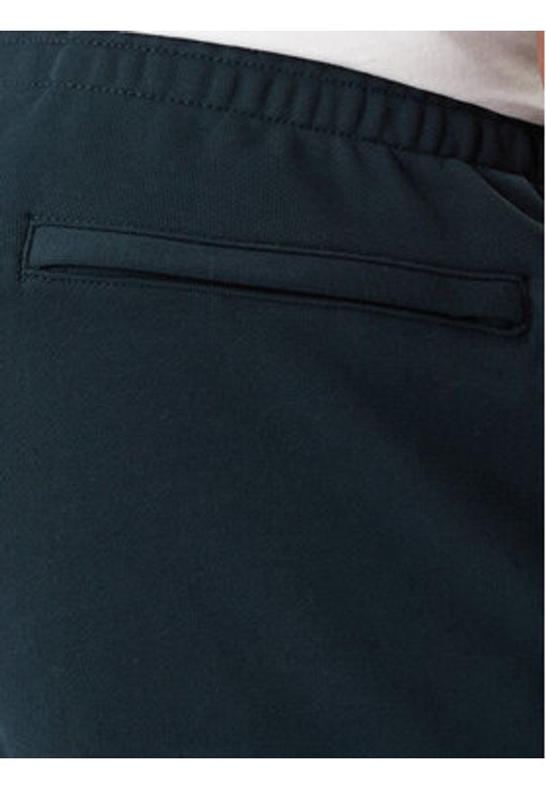 Calvin Klein Jeans Spodnie dresowe LV04RD241G Granatowy Regular Fit. Kolor: niebieski. Materiał: bawełna