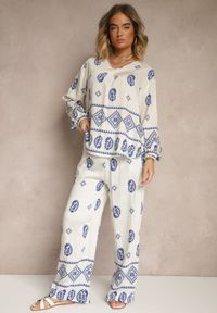 Renee - Biało-Niebieski Komplet w Stylu Etno Spodnie z Gumką w Pasie i Bluzka Oversize Eviralyn. Kolor: biały