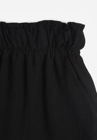 Born2be - Czarne Spodnie z Gumką w Pasie Angelona. Kolor: czarny. Materiał: materiał. Sezon: lato #10