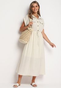 Born2be - Beżowa Wiskozowa Rozkloszowana Sukienka z Gumką w Talii Ozdobiona Guzikami Lemvia. Okazja: na spotkanie biznesowe. Kolor: beżowy. Materiał: wiskoza. Wzór: aplikacja. Typ sukienki: sportowe, rozkloszowane. Styl: sportowy, biznesowy, klasyczny, elegancki #6