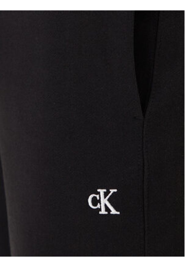 Calvin Klein Jeans Spodnie dresowe LV04RD241G Czarny Regular Fit. Kolor: czarny. Materiał: bawełna