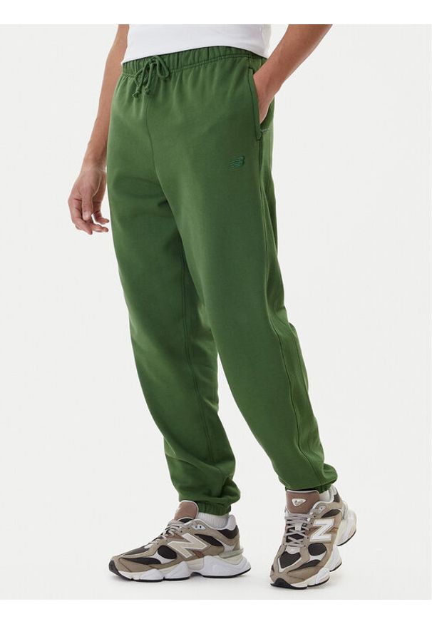 New Balance Spodnie dresowe MP41508 Zielony Relaxed Fit. Kolor: zielony. Materiał: bawełna