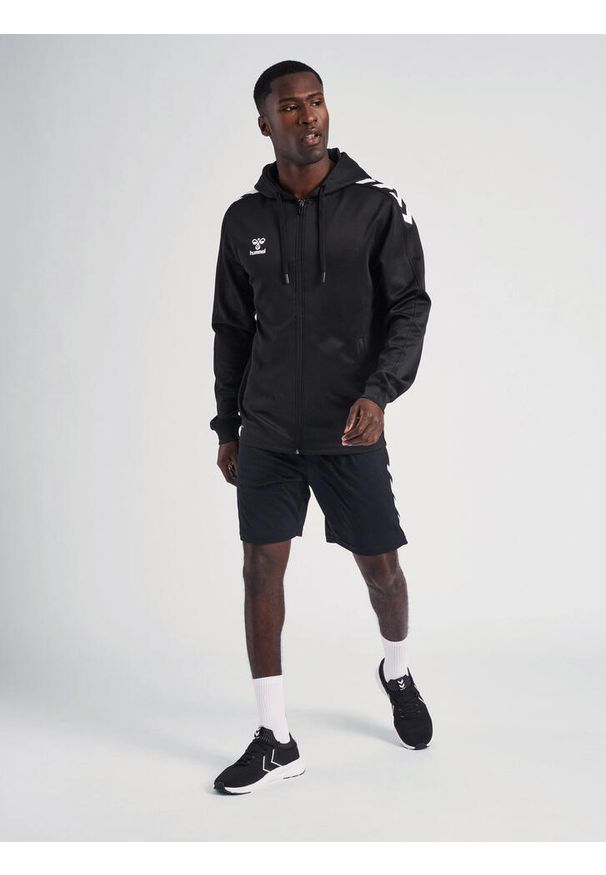 Bluza z kapturem na zamek Hummel hmlCORE. Typ kołnierza: kaptur. Kolor: czarny. Sport: piłka ręczna