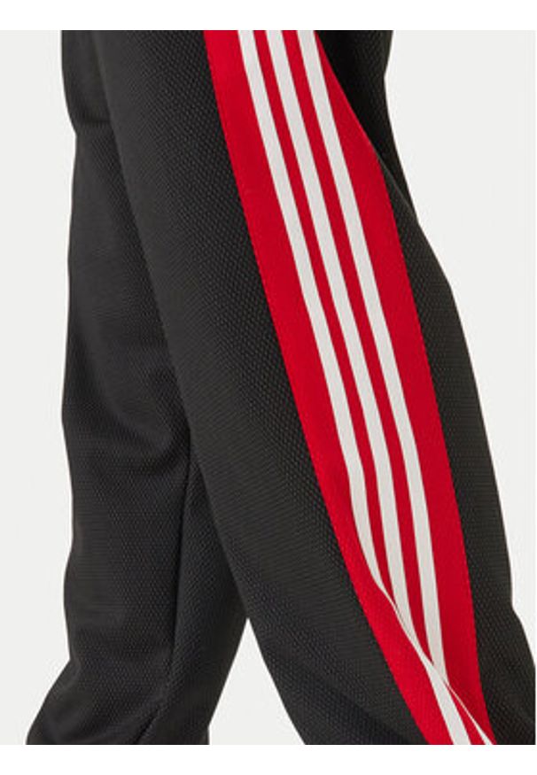 Adidas - adidas Spodnie dresowe KE0117 Czarny Loose Fit. Kolor: czarny. Materiał: syntetyk