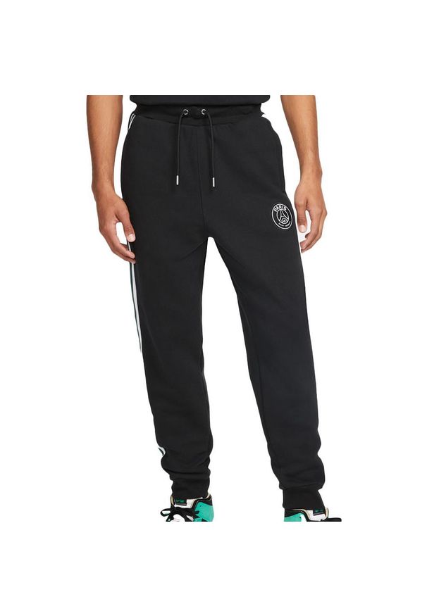 Spodnie sportowe męskie Nike Psg Jordan. Kolor: czarny. Materiał: dresówka