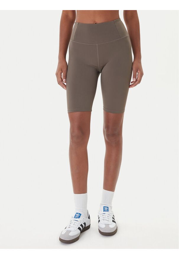 GIRLFRIEND COLLECTIVE - Girlfriend Collective Szorty sportowe Float 4023 Beżowy Slim Fit. Kolor: beżowy. Materiał: syntetyk
