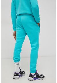 adidas Originals Spodnie męskie kolor turkusowy gładkie. Kolor: turkusowy. Materiał: materiał, bawełna. Wzór: gładki