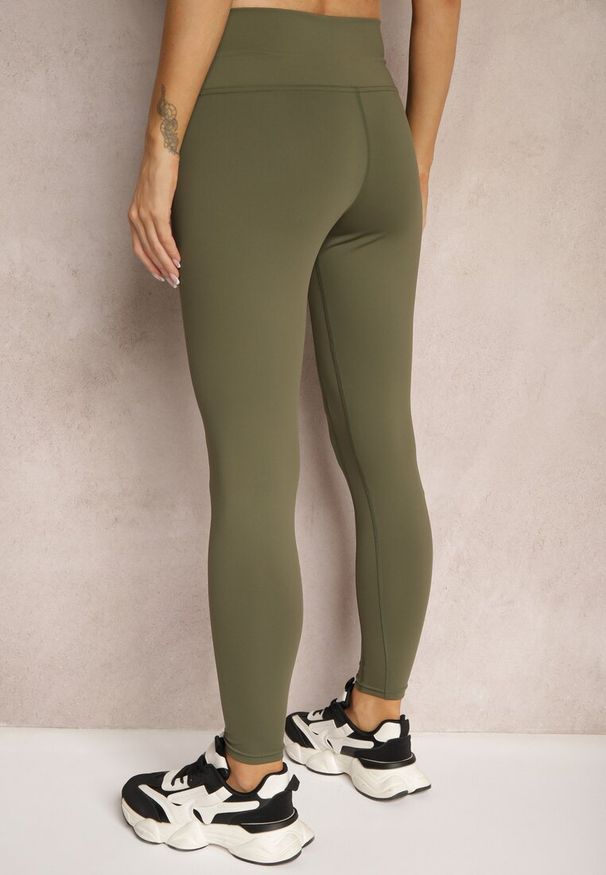 Renee - Ciemnozielone Sportowe Legginsy High Waist z Małym Ozdobnym Znaczkiem Lerilane. Stan: podwyższony. Kolor: zielony. Styl: sportowy