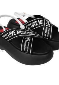 Love Moschino Sandały | JA16257I0IIX6 | Kobieta | Czarny, Biały. Okazja: na co dzień, na spacer. Zapięcie: pasek. Kolor: czarny, biały, wielokolorowy. Materiał: skóra. Wzór: nadruk. Styl: casual, elegancki