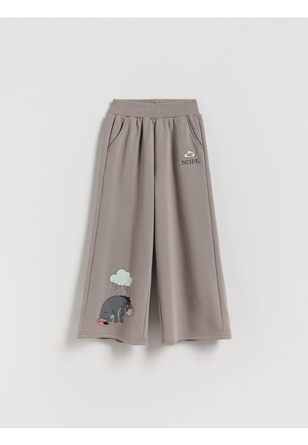 Reserved - Dzianinowe spodnie Kubuś i Przyjaciele - ciemnoszary. Kolor: szary. Materiał: dzianina