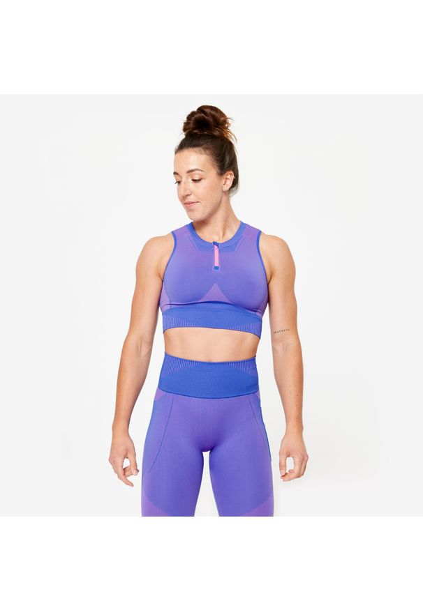 DOMYOS - Koszulka fitness damska Domyos crop top bez rękawów. Kolor: niebieski, różowy, wielokolorowy. Materiał: poliamid, elastan, materiał, poliester. Długość rękawa: bez rękawów. Sport: fitness