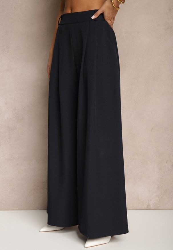 Renee - Granatowe Eleganckie Spodnie Palazzo z Szerokimi Nogawkami Adivisa. Stan: podwyższony. Kolor: niebieski. Styl: elegancki