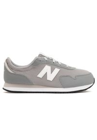 Buty dziecięce New Balance GC323GR – szare. Okazja: na uczelnię, na co dzień. Kolor: szary. Materiał: materiał, syntetyk. Szerokość cholewki: normalna