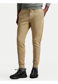 Polo Ralph Lauren Spodnie dresowe 710881518082 Beżowy Regular Fit. Kolor: beżowy. Materiał: bawełna