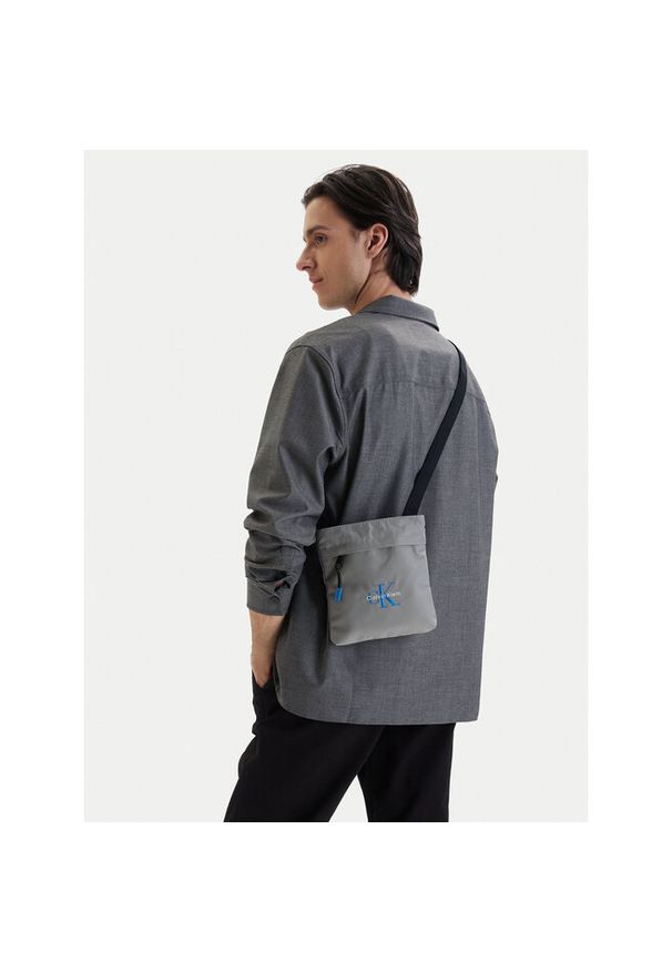 Saszetka Calvin Klein. Kolor: szary