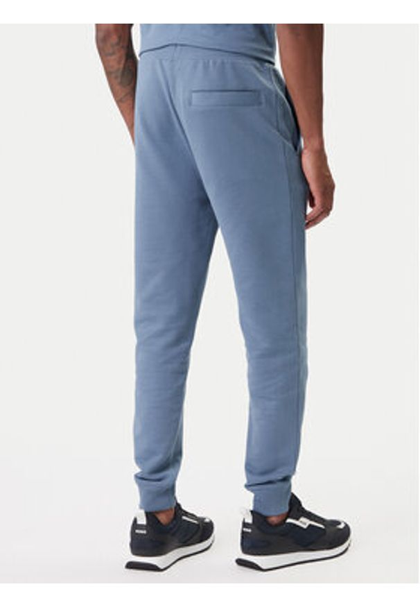Hugo - HUGO Spodnie dresowe Doak212 50447963 Granatowy Regular Fit. Kolor: niebieski. Materiał: bawełna
