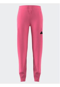 Adidas - adidas Spodnie dresowe IK5714 Różowy Regular Fit. Kolor: różowy. Materiał: bawełna #3