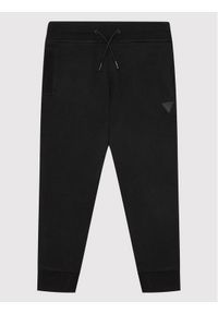 Guess Spodnie dresowe L2YQ46 KAIJ1 Czarny Regular Fit. Kolor: czarny. Materiał: bawełna