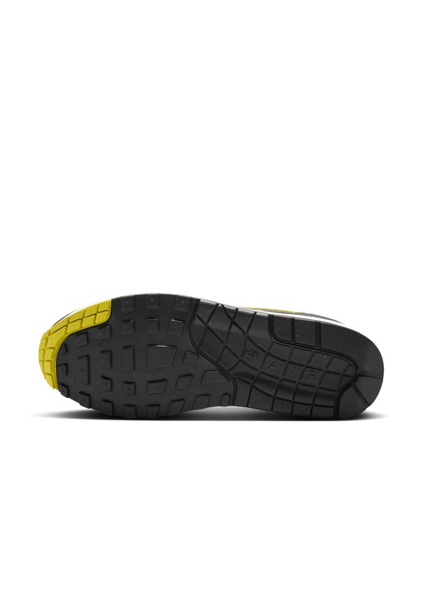 Nike Air Max 1 "Batman" Sneakersy męskie. Okazja: na co dzień. Kolor: czarny. Materiał: materiał, skóra, zamsz. Szerokość cholewki: normalna. Wzór: motyw z bajki. Model: Nike Air Max