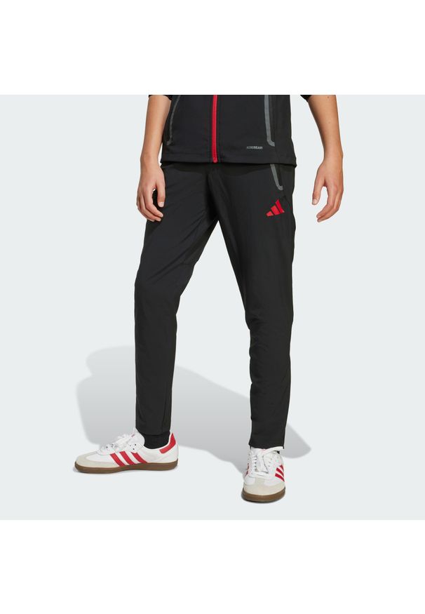 Adidas - Dziecięce spodnie Liverpool FC Tiro 25 Competition Vis Tech Travel. Kolor: czarny. Sport: piłka nożna