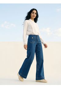 Sinsay - Jeansy wide leg z efektem sprania - granatowy. Kolor: niebieski