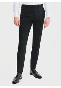 Pako Lorente - PAKO LORENTE – Wełniane spodnie garniturowe w kolorze czarnym. Okazja: na spotkanie biznesowe. Kolor: czarny. Materiał: wełna. Styl: elegancki, biznesowy