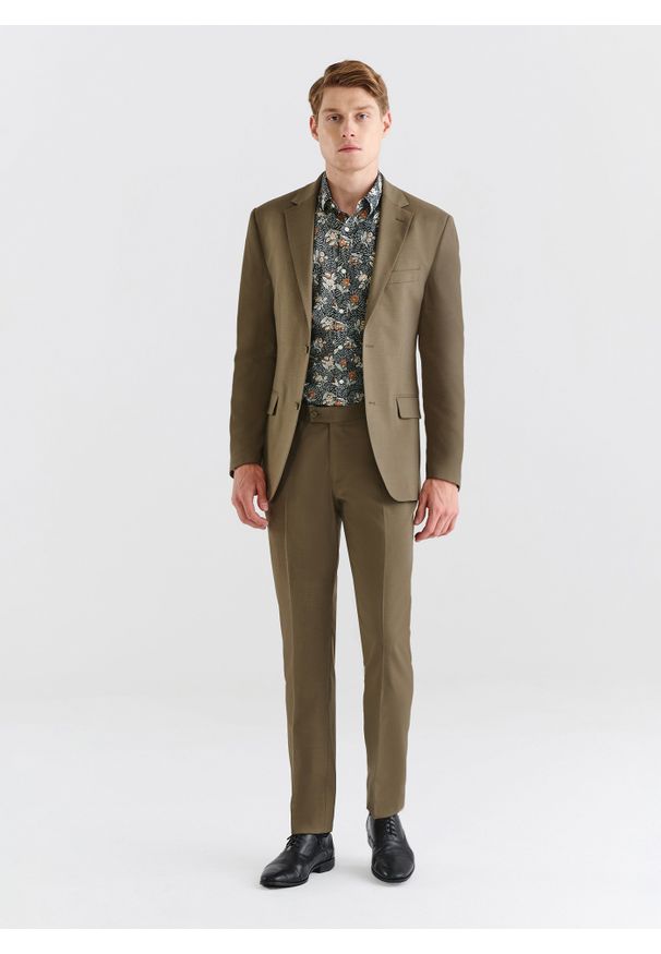 Pako Lorente - PAKO LORENTE – Zielone spodnie garniturowe z wełną. Kolor: zielony. Materiał: wełna