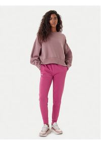 Under Armour Spodnie dresowe Ua Rival 1379438 Różowy Loose Fit. Kolor: różowy. Materiał: bawełna